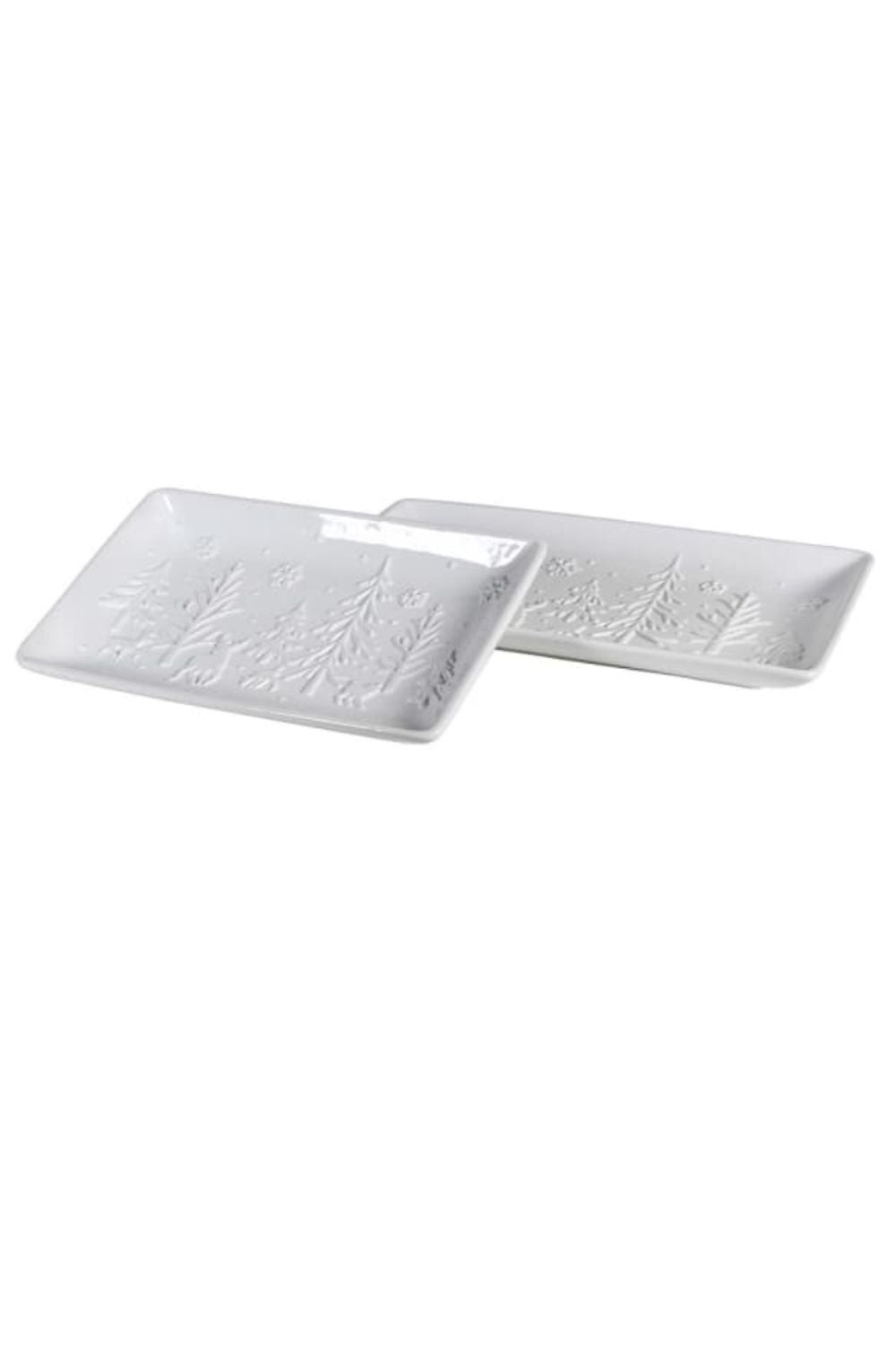 Two white ceramic trays with textured design on a white background