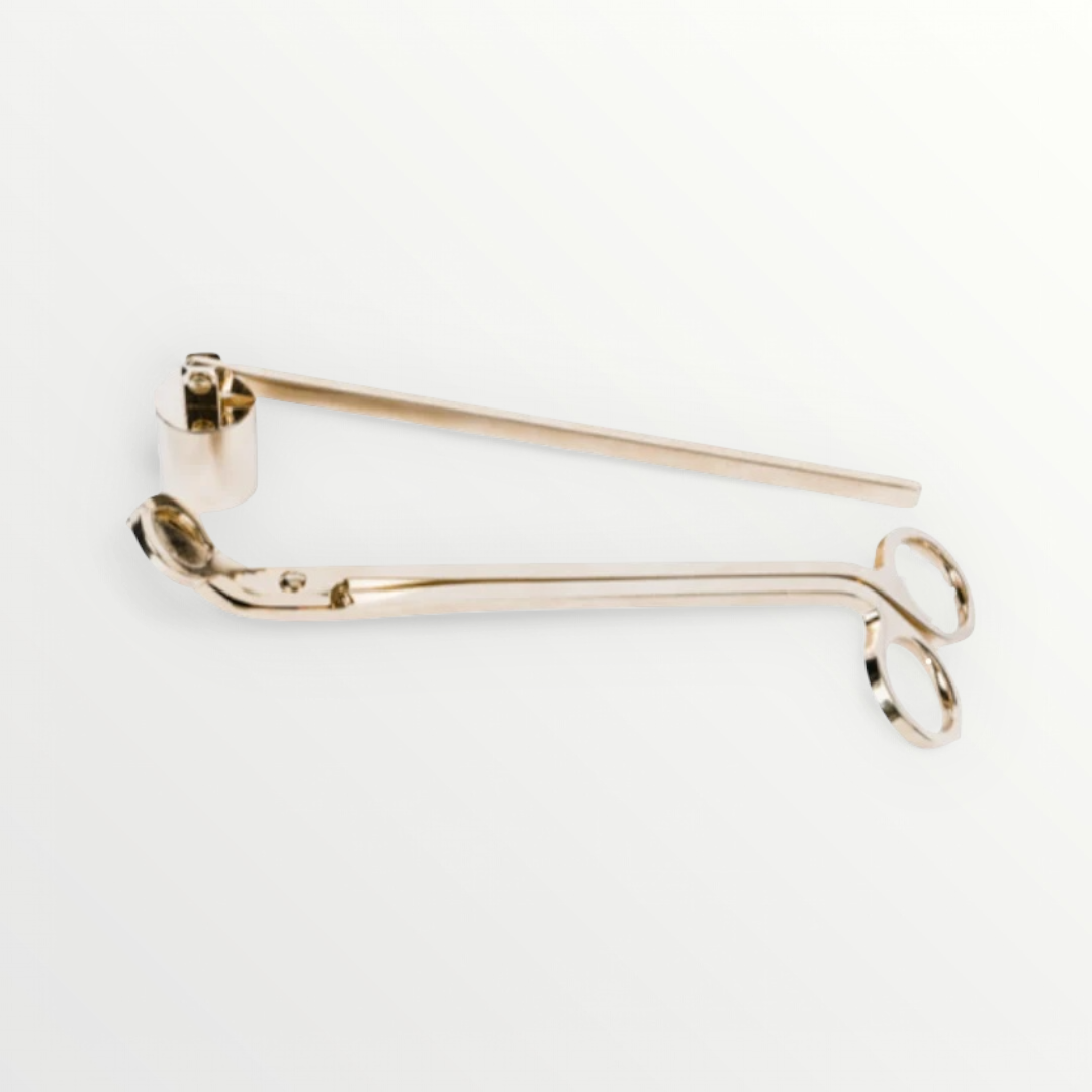 A gold stainless steel candle snuffer and trimmer set on a white background.
