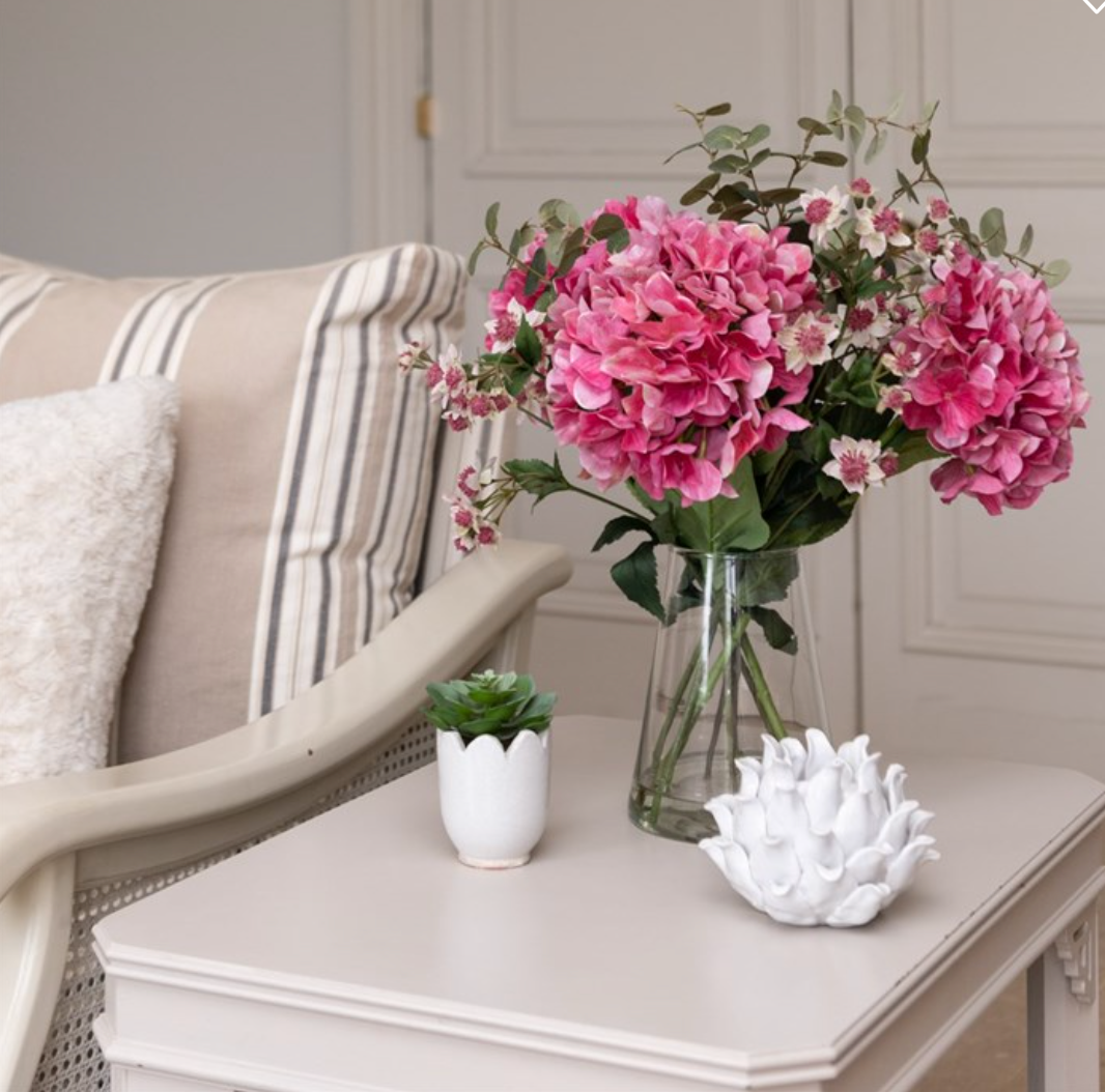Faux Pink Hydragena Arrangement on a side table