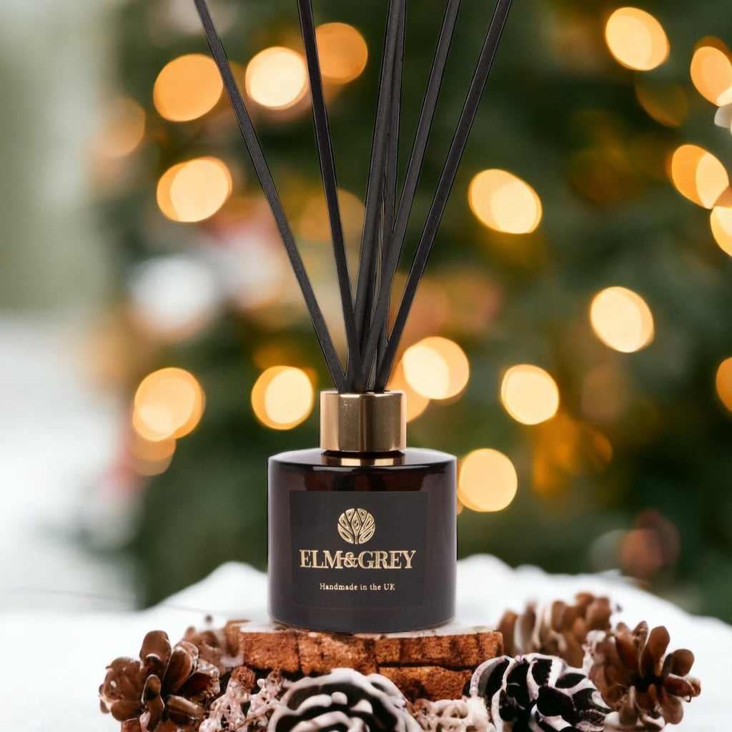 Elm & Grey Diffuser with Christmas Lights in the background