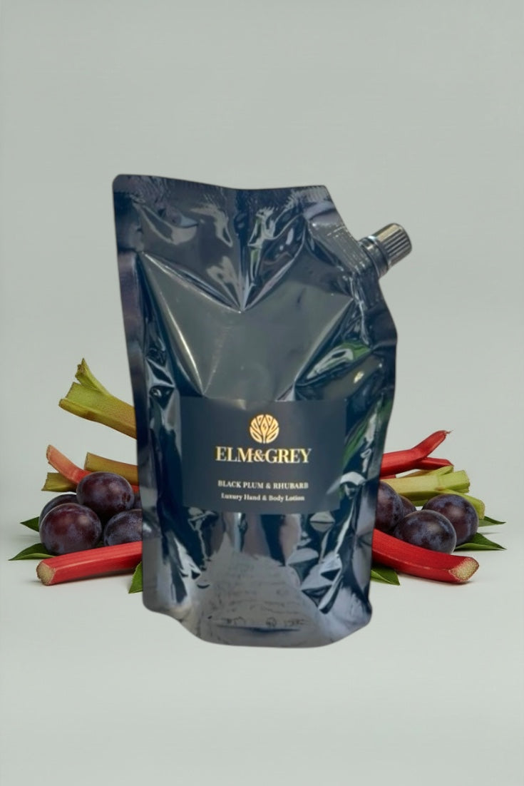 Elm & Grey refill hand lotion pouch with plums and rhubarb on a light grey background