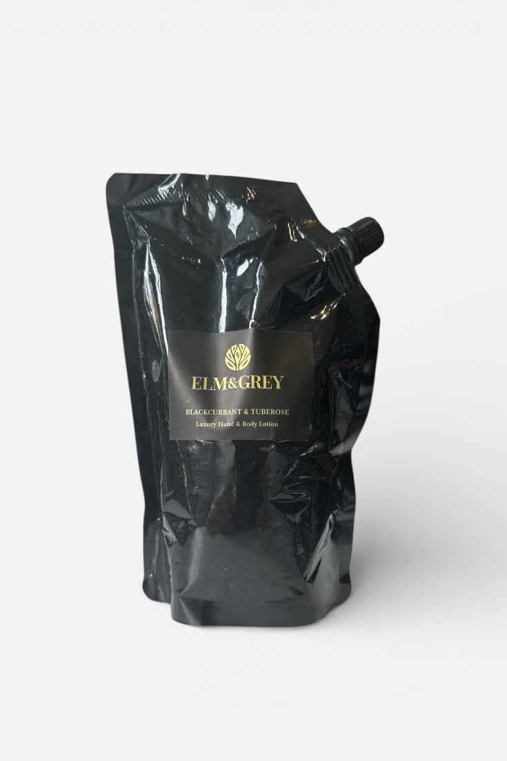 Black refill pouch with Elm and grey branding on a white background