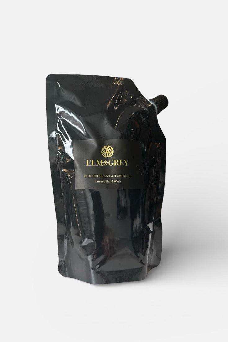 Black hand wash refill pouch with Elm and grey branding on a white background