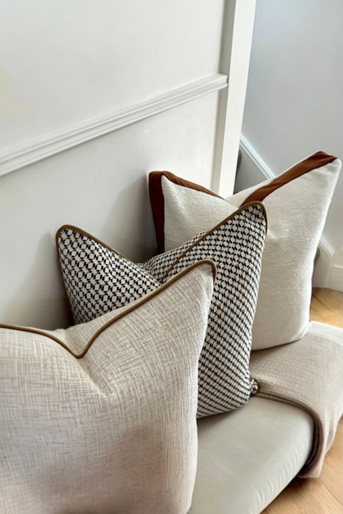 Onacara bouclé square cushion trio in warm natural tones — Elm & Grey home accessories