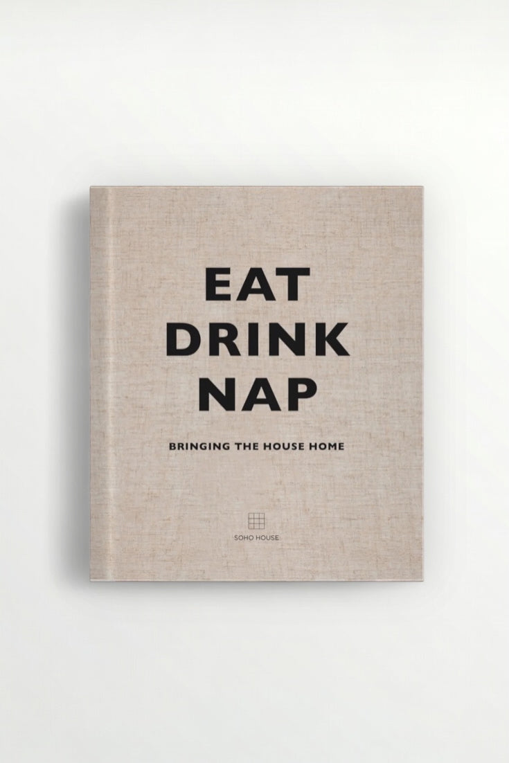 Book titled 'Eat Drink Nap' by Soho House on a light grey background, Elm & Grey.
