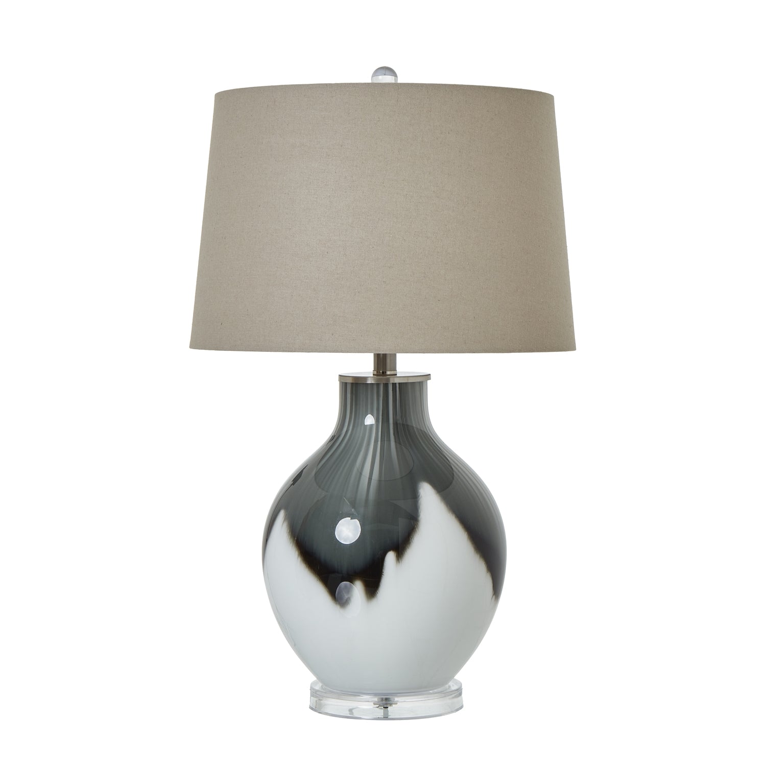 Table lamp with a grey and white base and beige lampshade on a white background