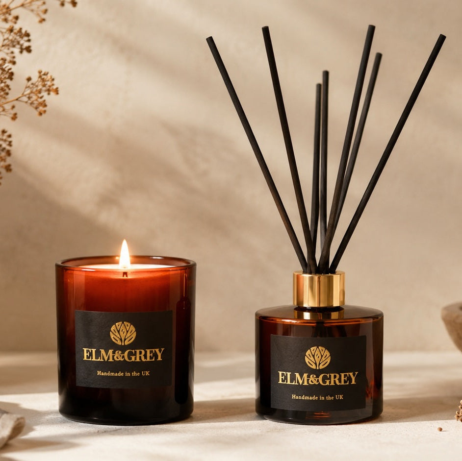 elm and grey candle and diffuser colleciton image on a neutral setting
