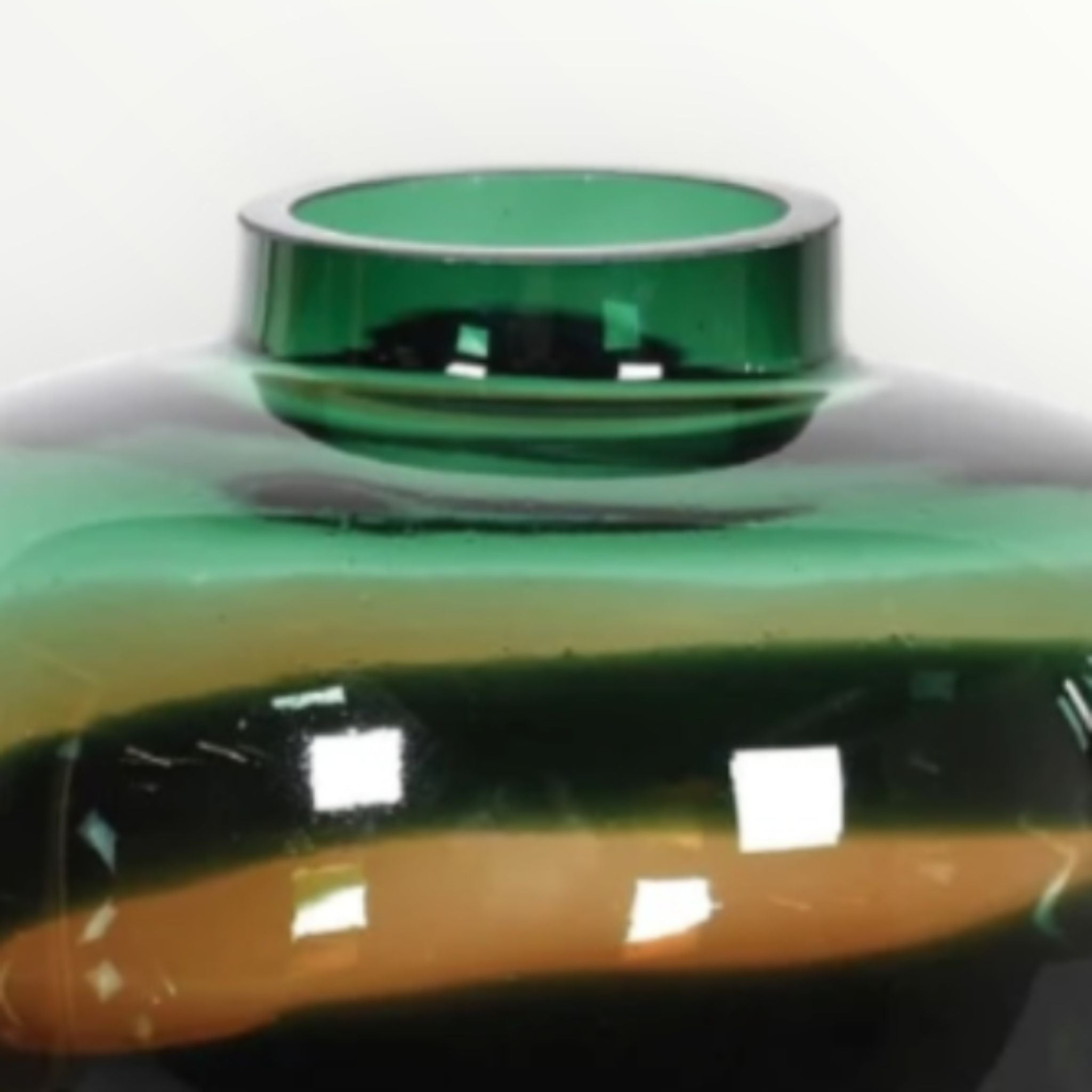Close-up of a green glass vase elmandgrey