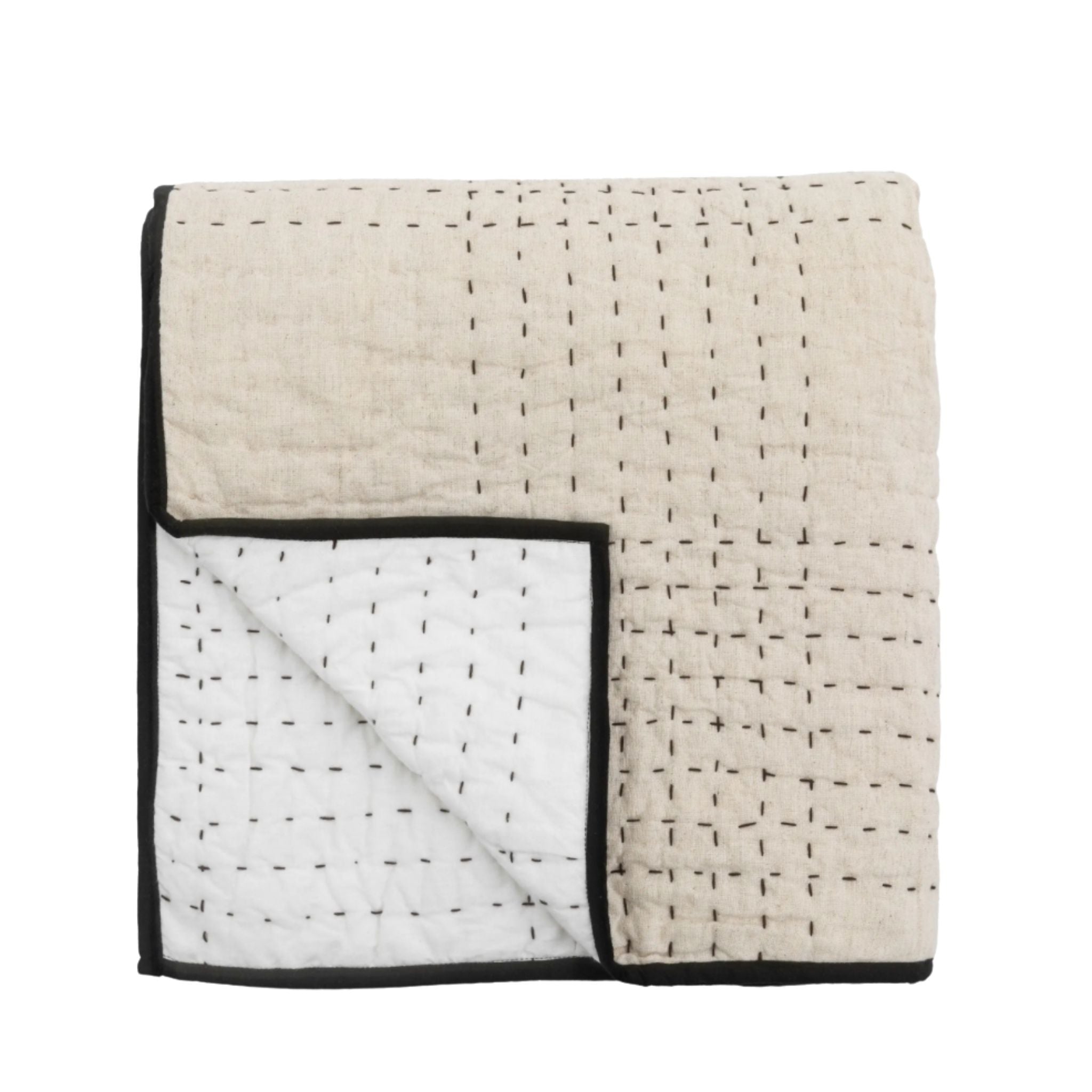 Quilt with geometric pattern on a white background