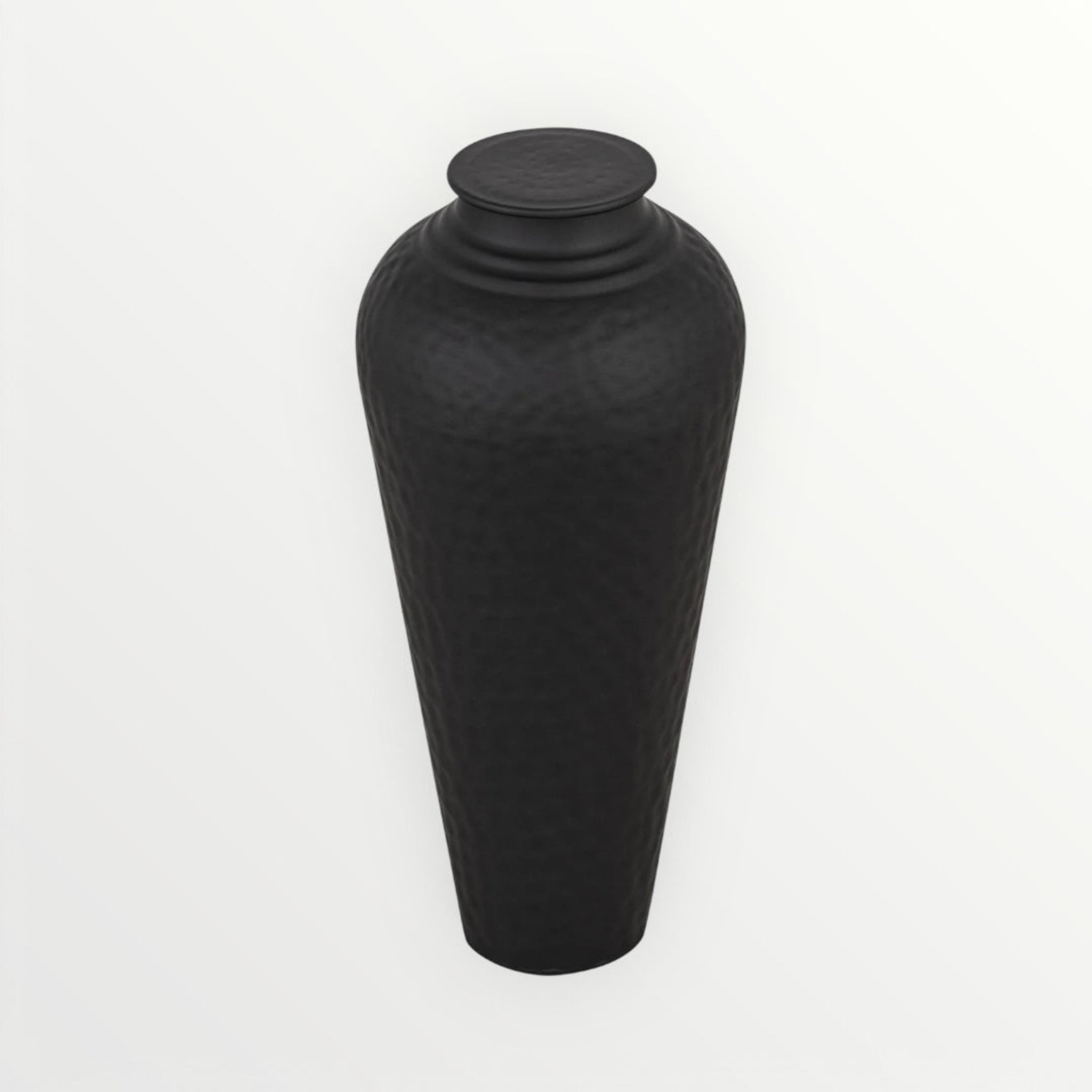 Black textured vase on a white background