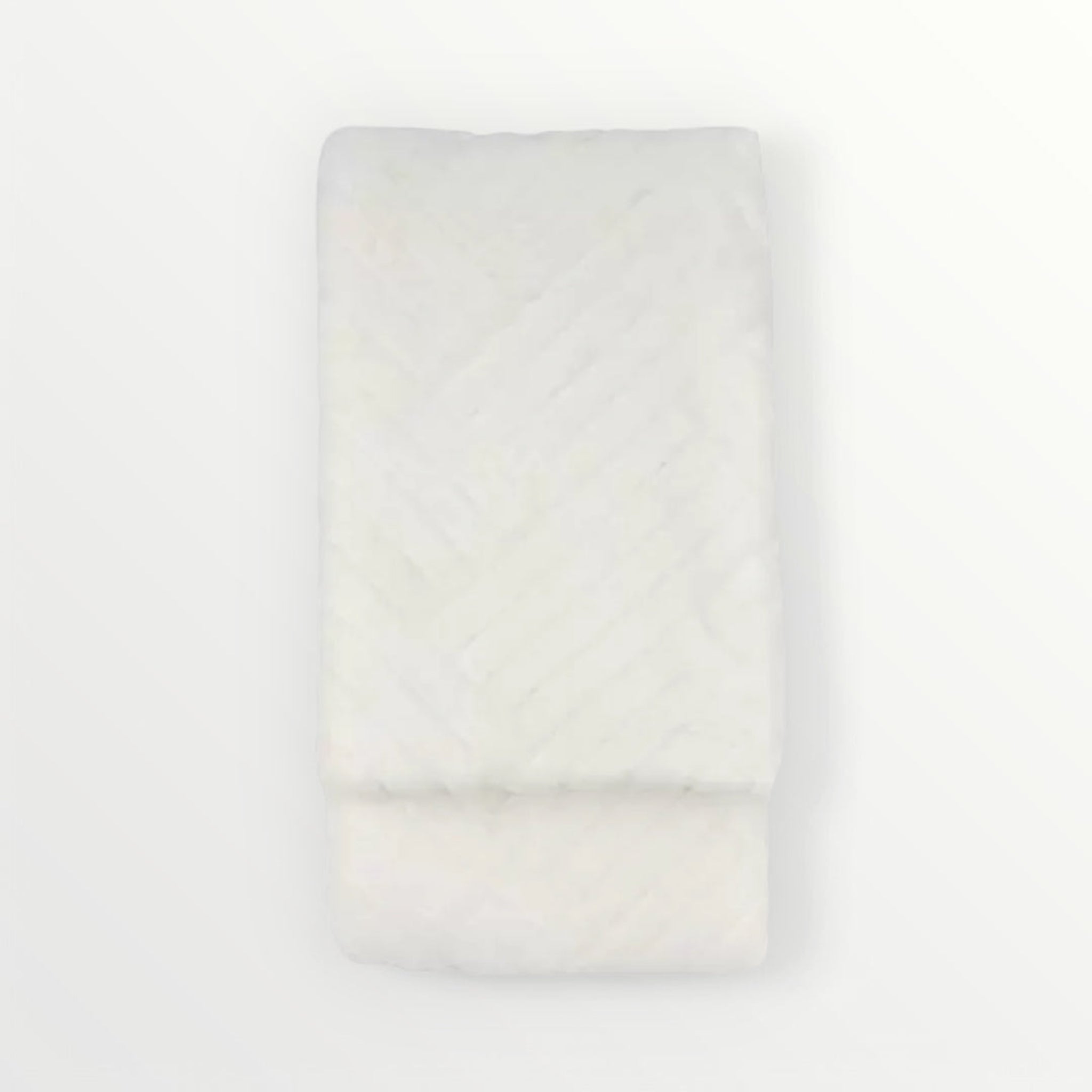 White throw on a white background