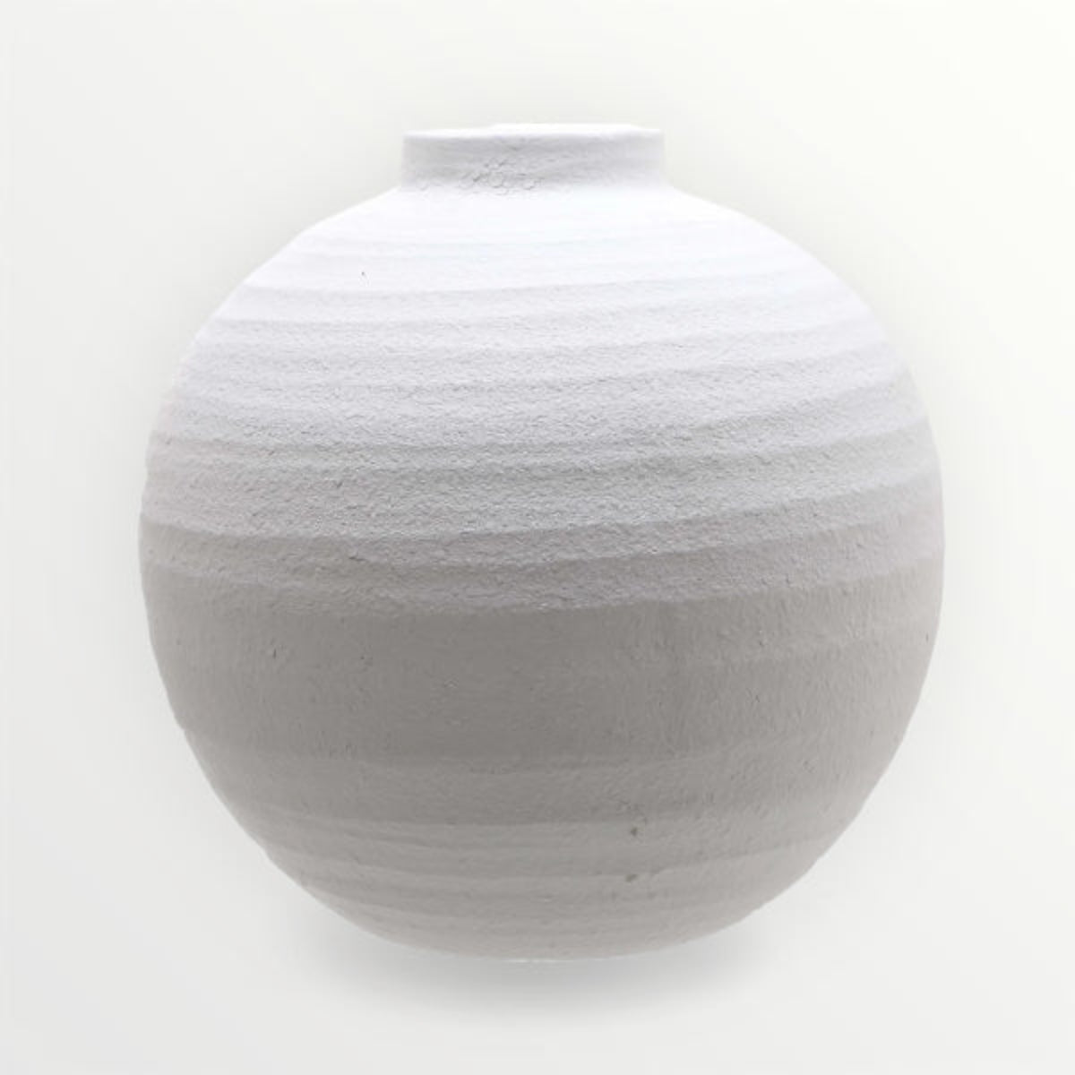 White textured vase on a white background