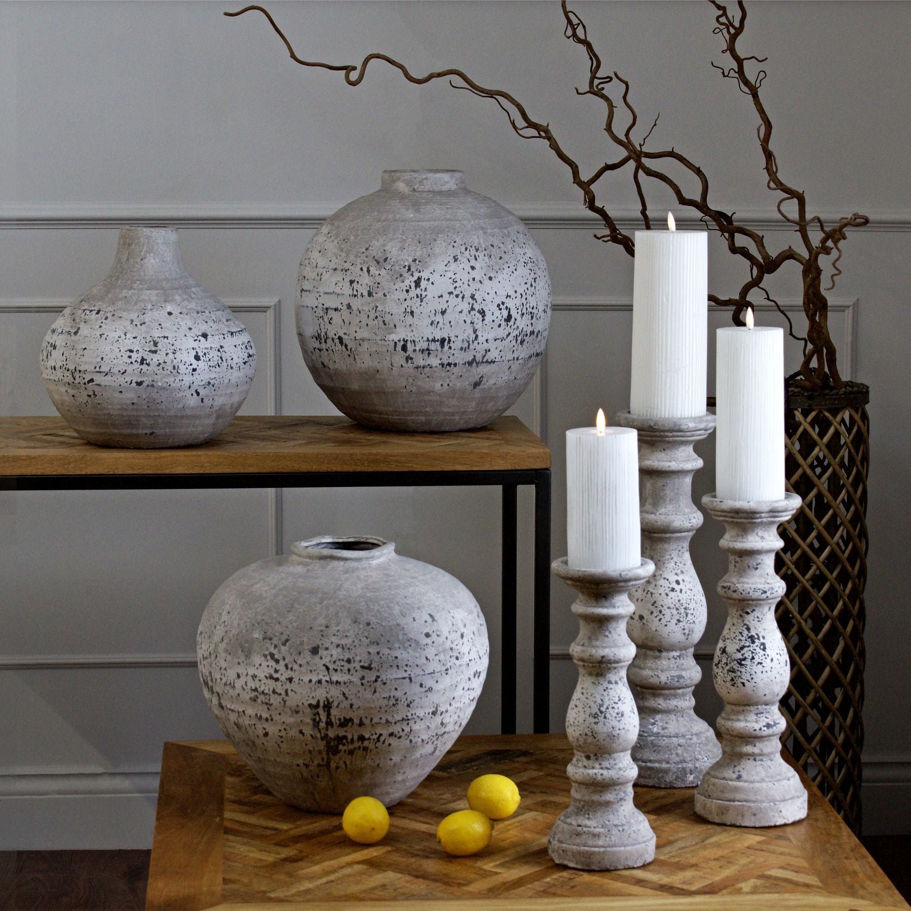 Collection of ceramic vases in rustic style on a table