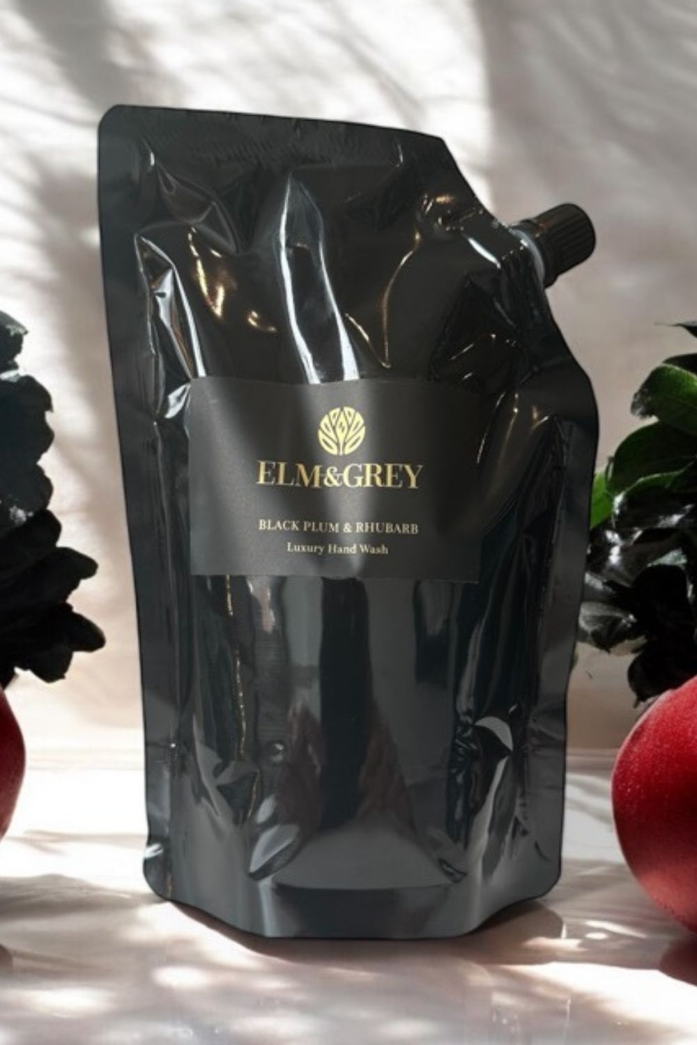 Black refill wash pouch with 'Elm&Grey' branding on a light background