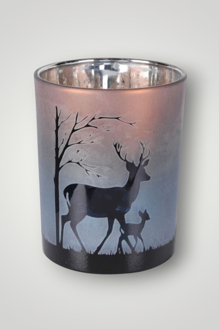 Candle holder with deer design on a white background