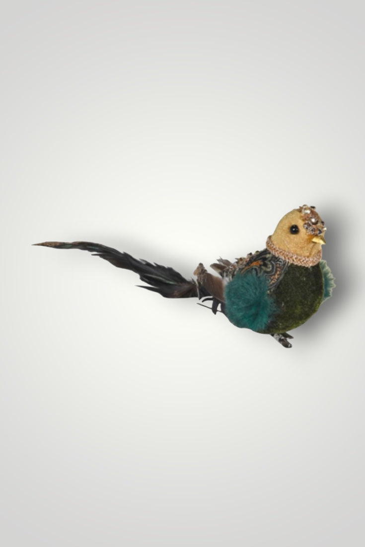 Toy bird with a green body and brown head on a white background