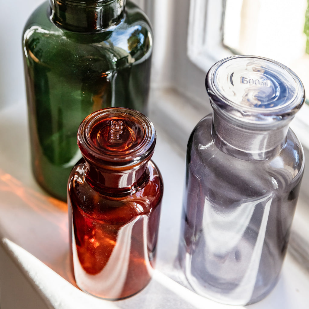 Trio of Coloured Glass Bottles in Smoky Grey