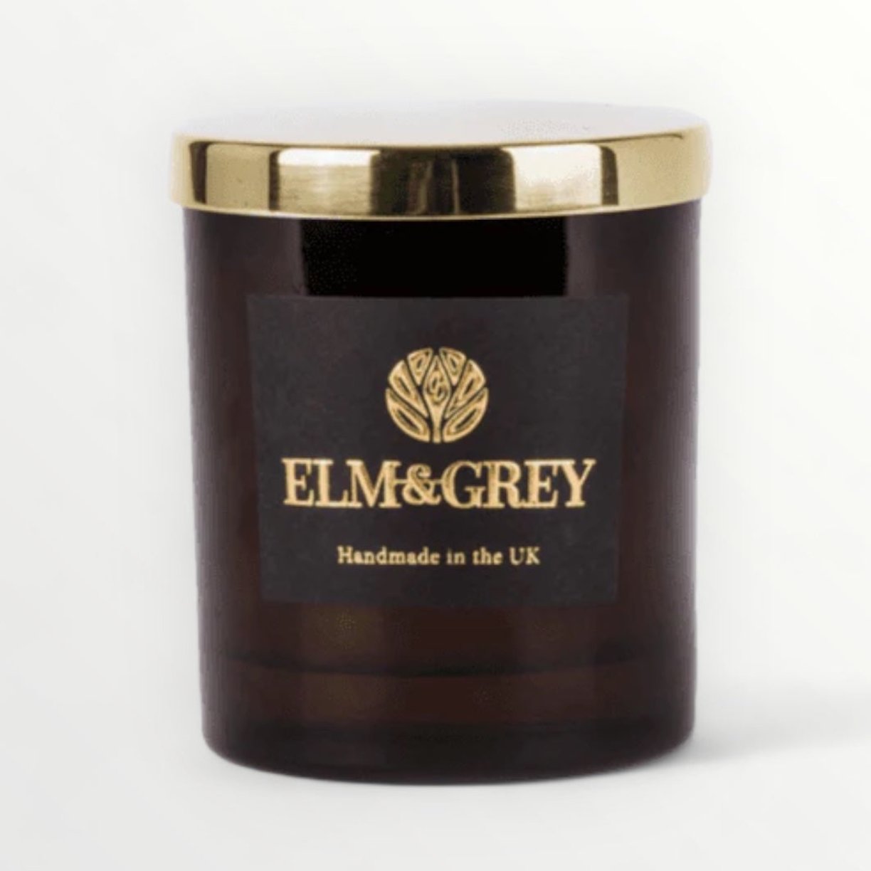 Amber container jar from elm and grey with a gold lid