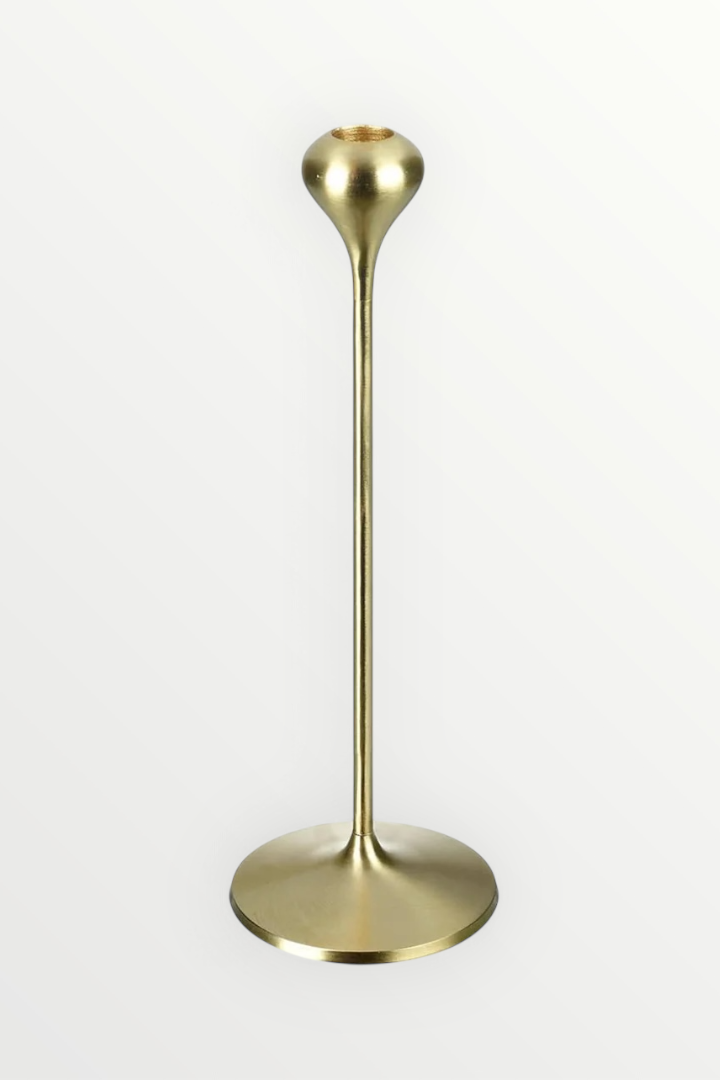 brass candlestick on white background