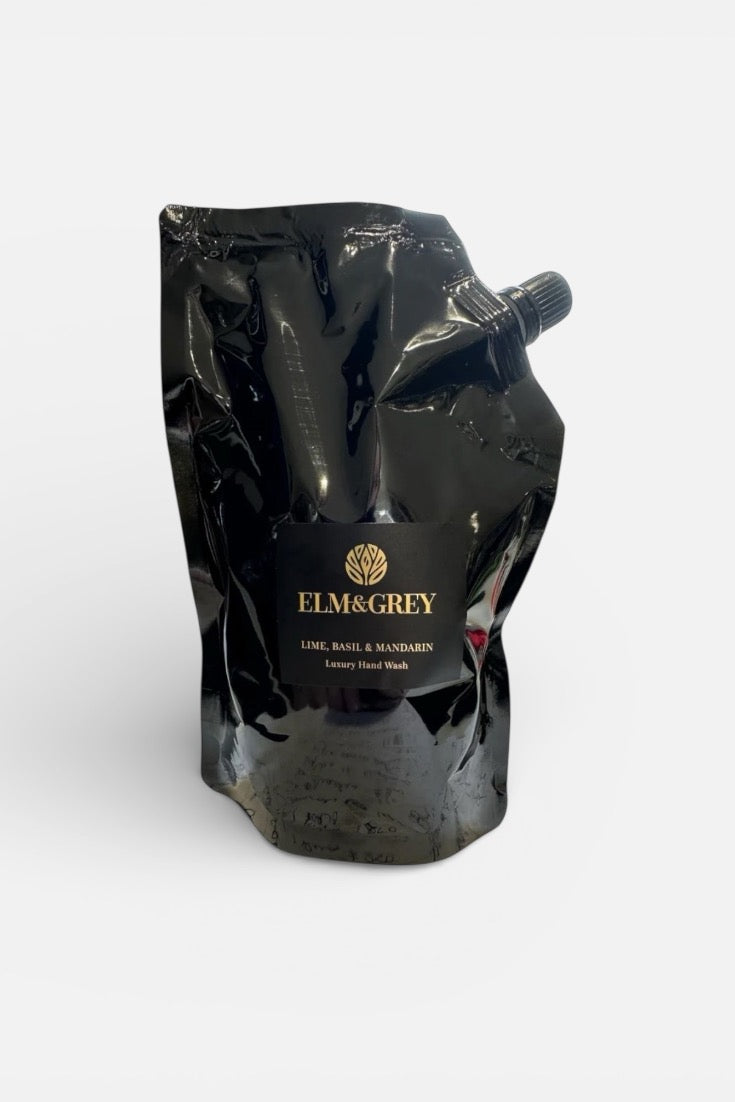 Black plastic bag with 'Elm & Grey' branding on a white background