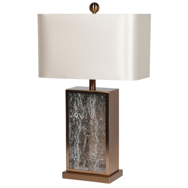 Bronze coloured textured glass table lamp on a white background