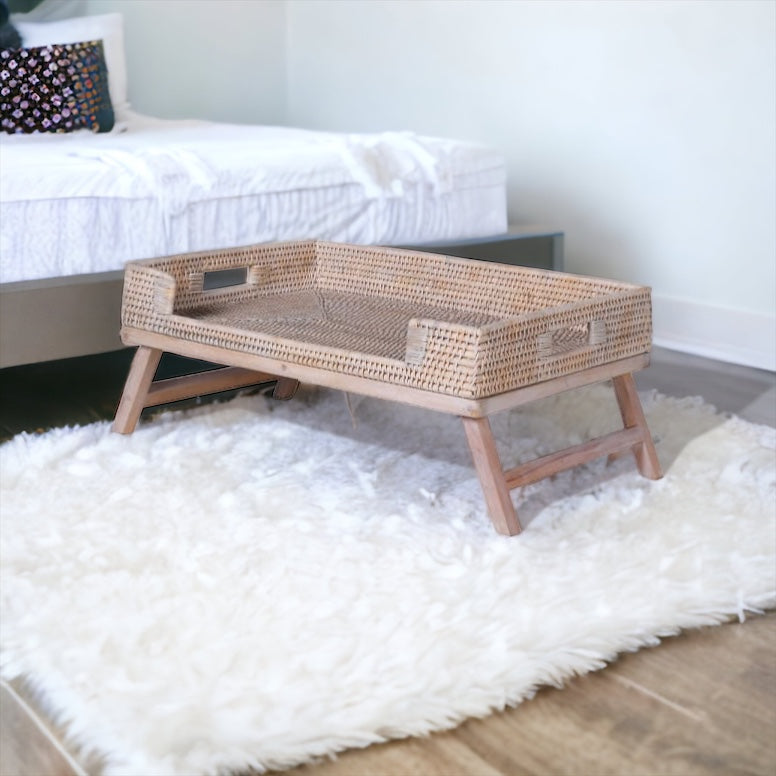 Lime Washed Rattan Breakfast Tray On Legs on a fur rug