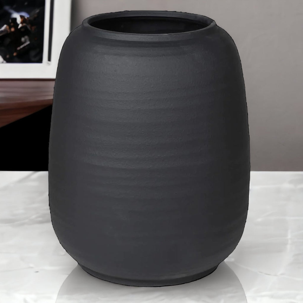 Measuring 420mm tall and 355mm wide this impressive black ceramic matt vase is an excellent statement piece and perfect for displaying a large bouquet or display.