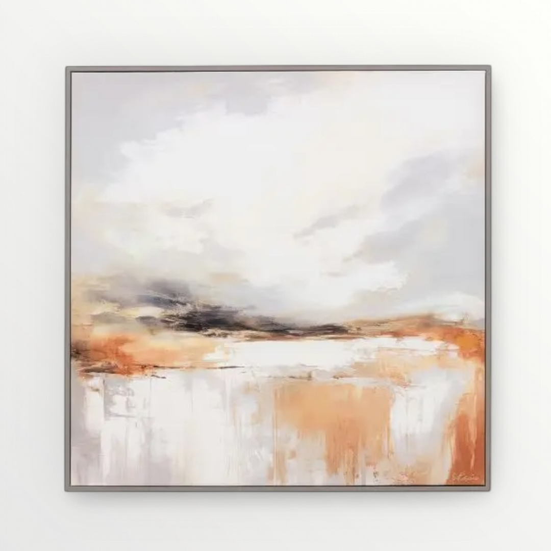 Framed abstract art with soft colors on a white wall