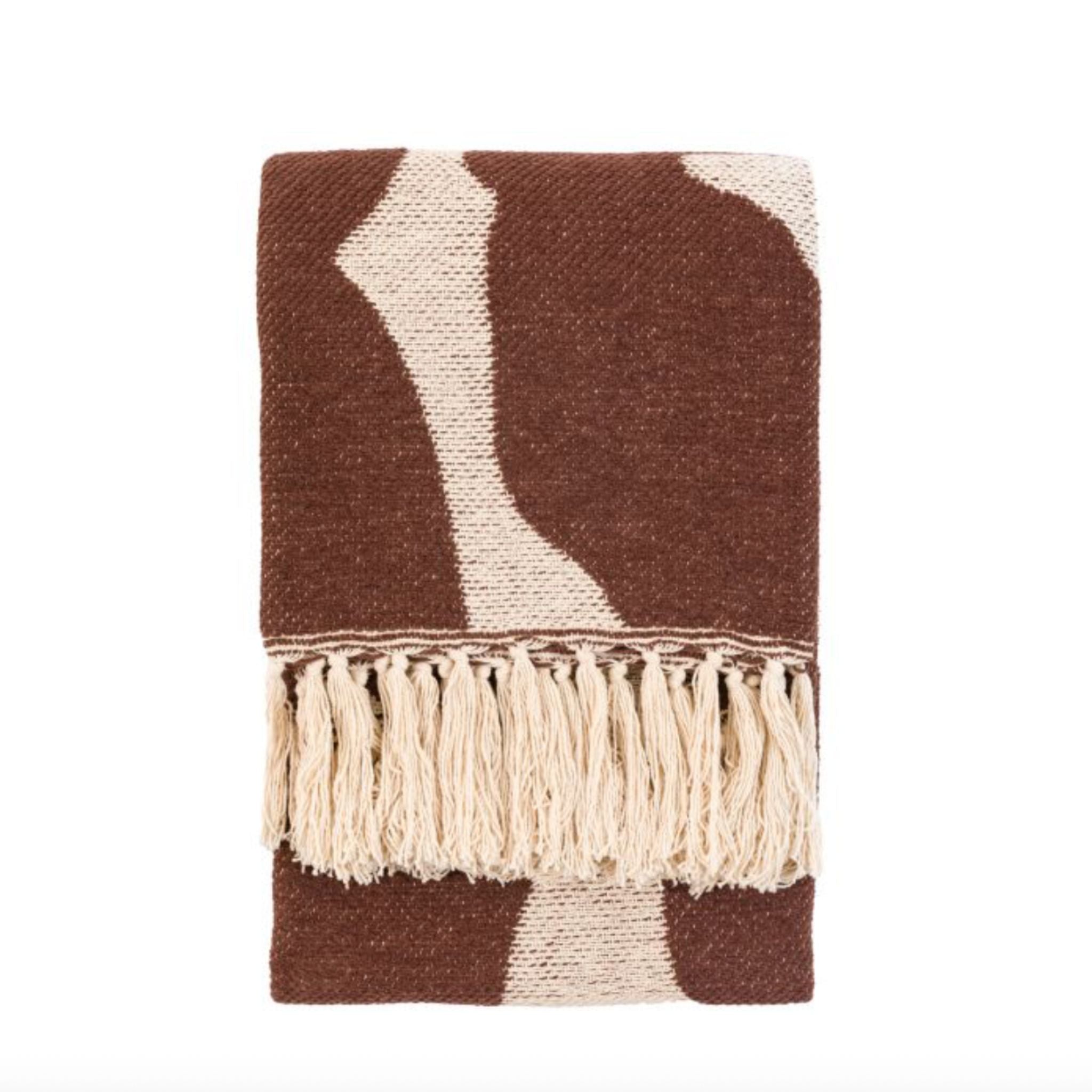 Brown and cream patterned blanket with tassels on a white background