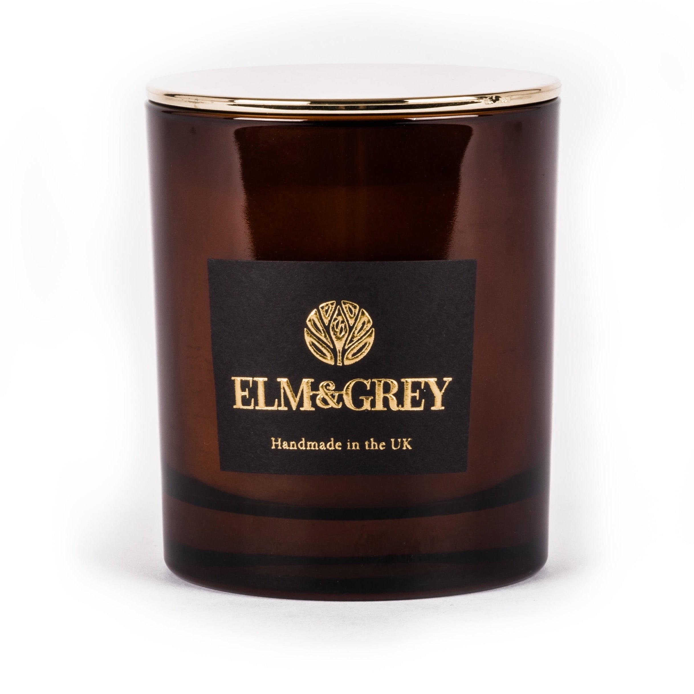 amber 220g candle with gold flat lid