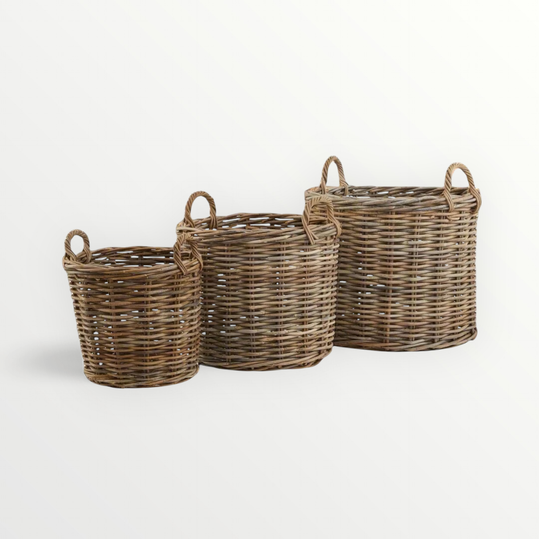A set of three round rattan storage baskets in varying sizes, each with two handles, displayed against a neutral background.