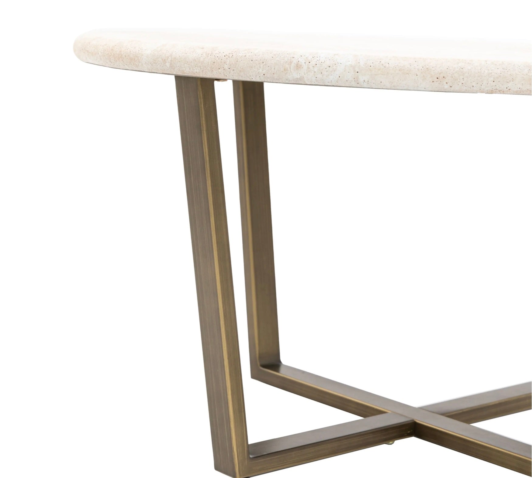 Round travertine effect coffee table with brass metal legs on a white background