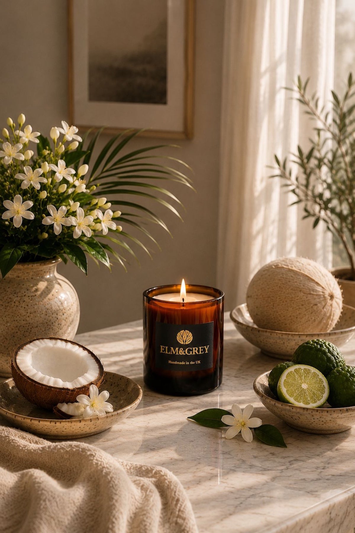 Elm & Grey Bergamot Coconut & Jasmine luxury scented candle in a bright sunlit interior with coconut, citrus and jasmine botanicals, inspired by fresh uplifting home fragrance rituals.
