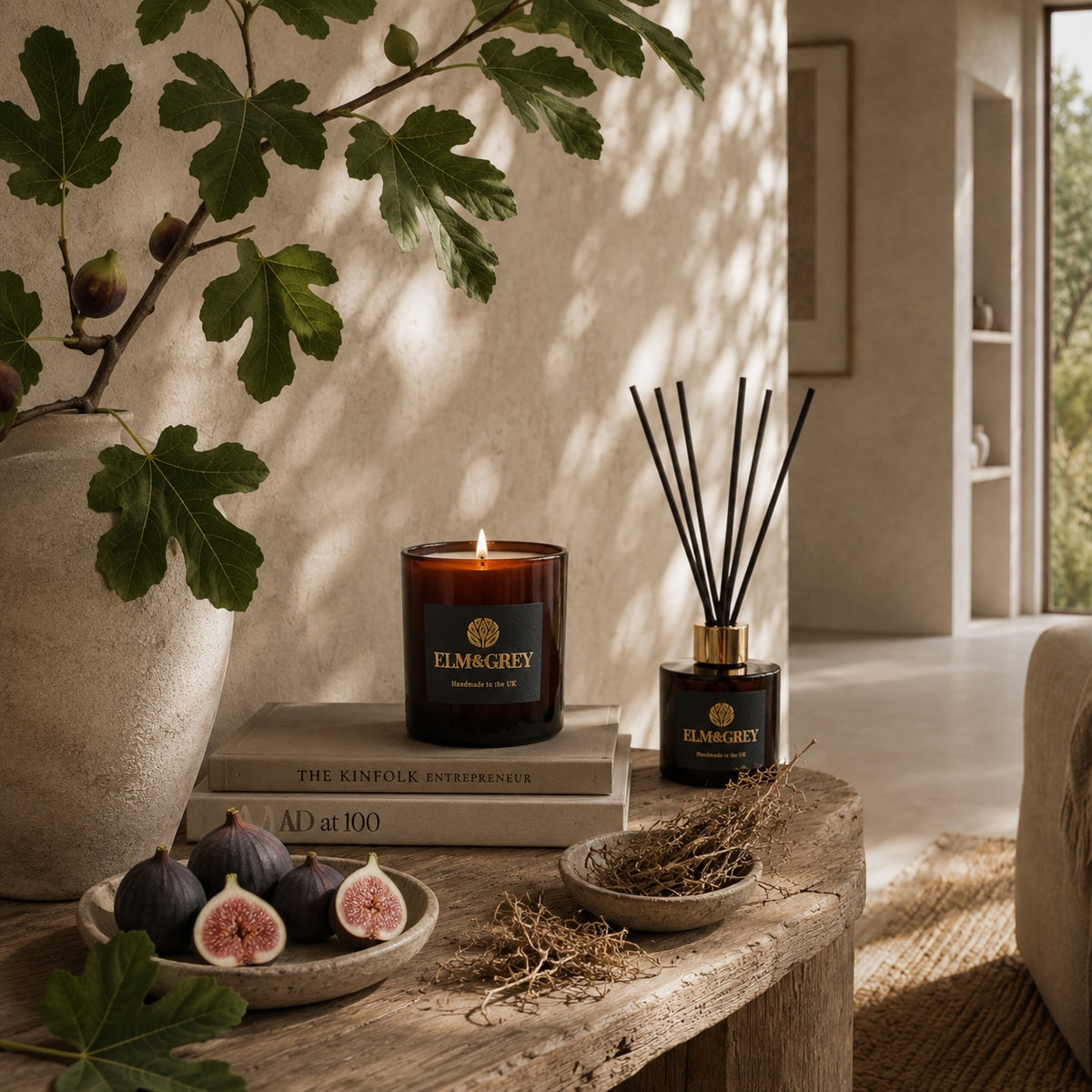 Elm & Grey Black Fig & Vetiver candle and reed diffuser in a fresh contemporary living space