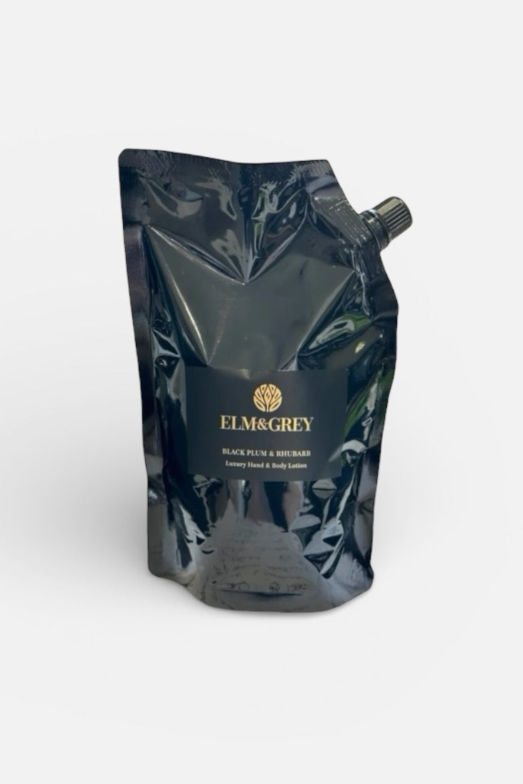 Black refill hand lotion pouch packaging with 'Elm&Grey' branding on a white background
