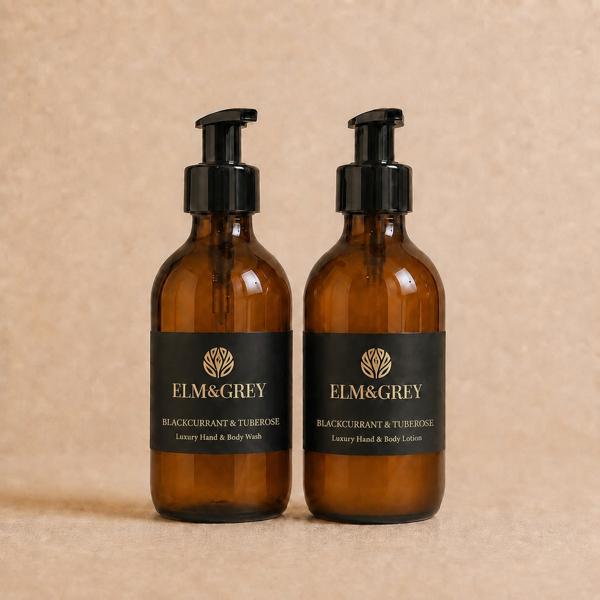 Elm & Grey Blackcurrant & Tuberose luxury hand wash and hand and body lotion in amber glass bottles