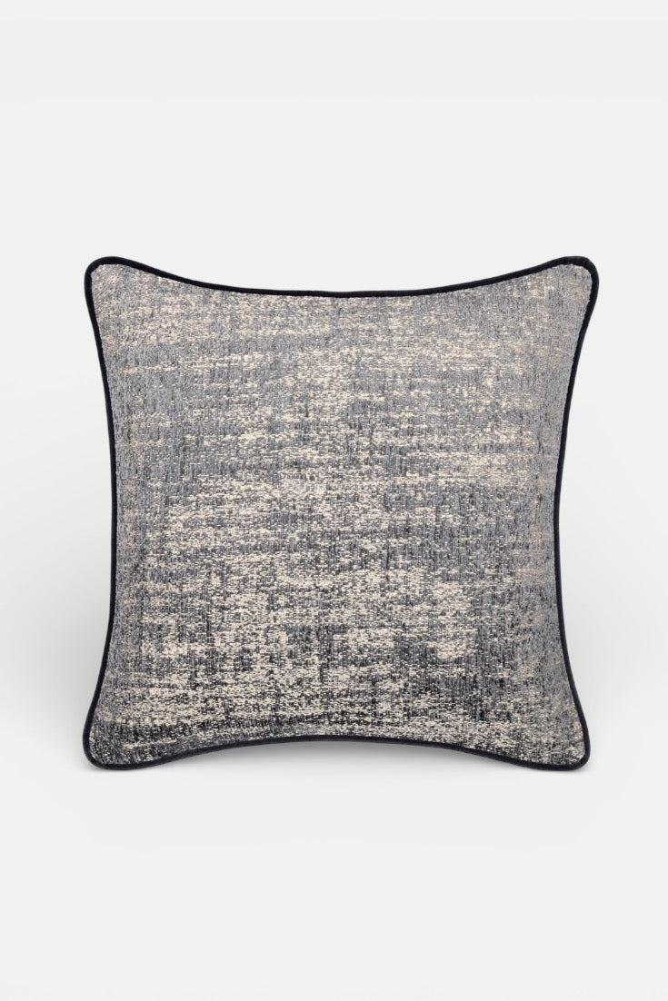 Textured gray pillow on a white background