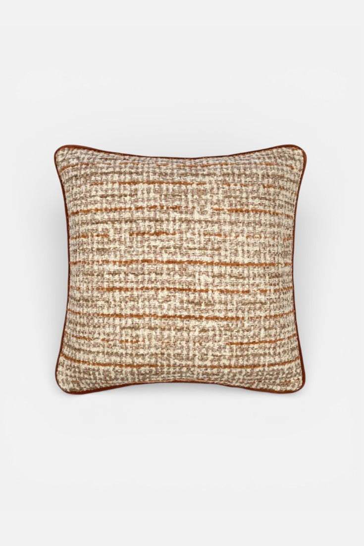 Textured square cushion on a white background