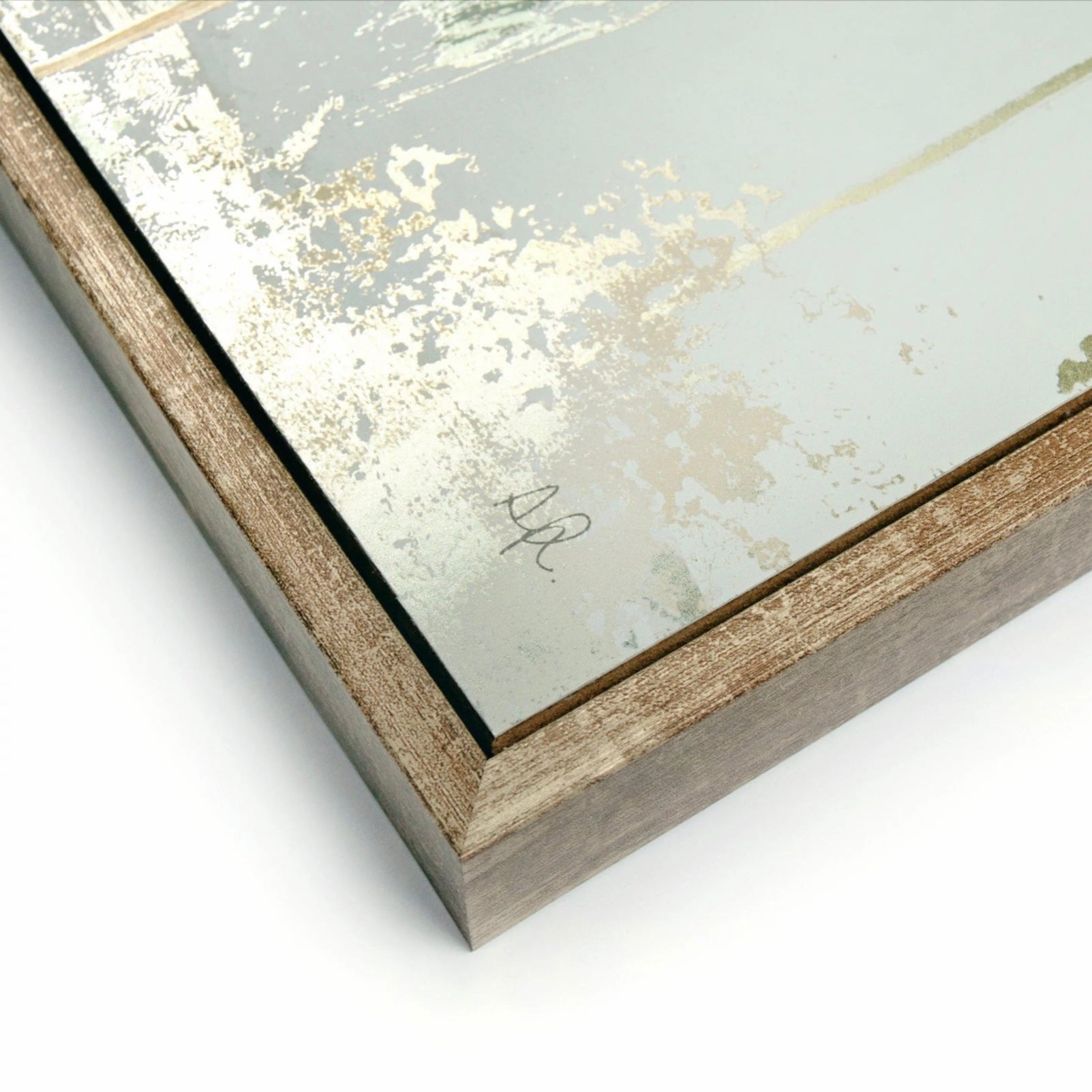 Framed artwork with gold leaf detailing on a white background