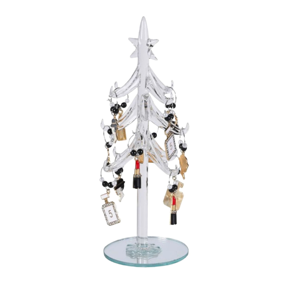 White jewellery tree with various couture charms on a white background