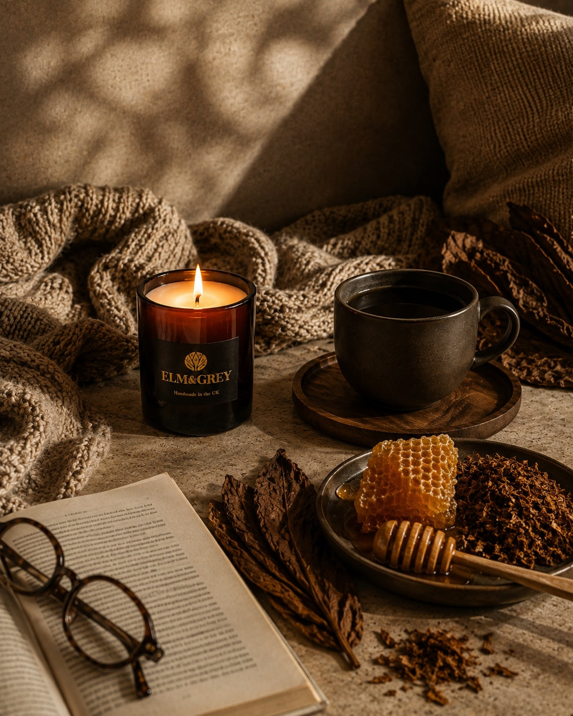 Elm & Grey Dark Honey & Tobacco candle styled for a warm relaxing evening at home