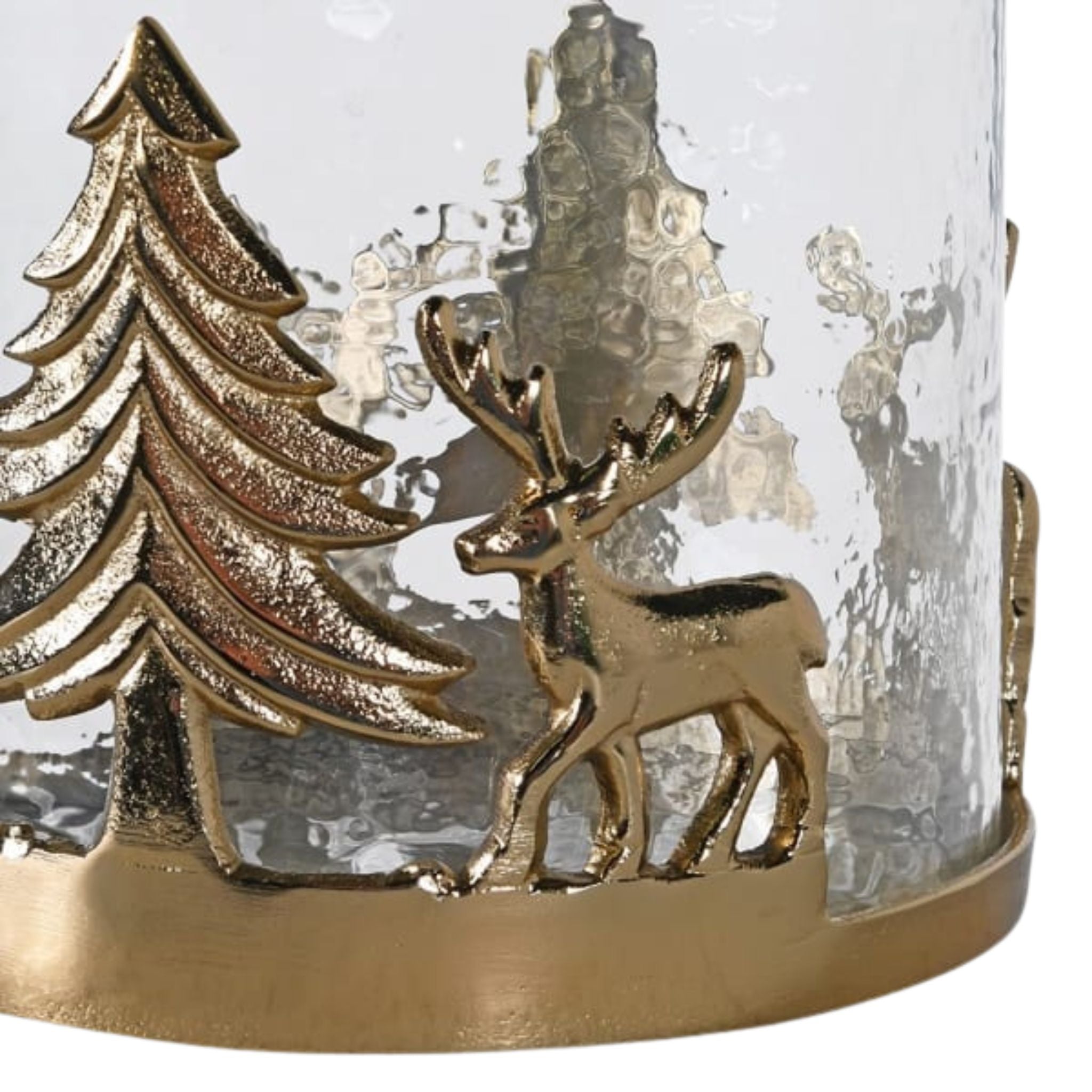 A glass hurricane encircled by golden reindeer and firs