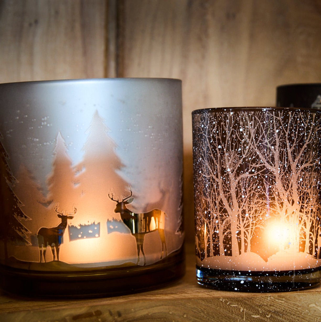 gold deer candle holder sand woodland scene candleholder on a shelf