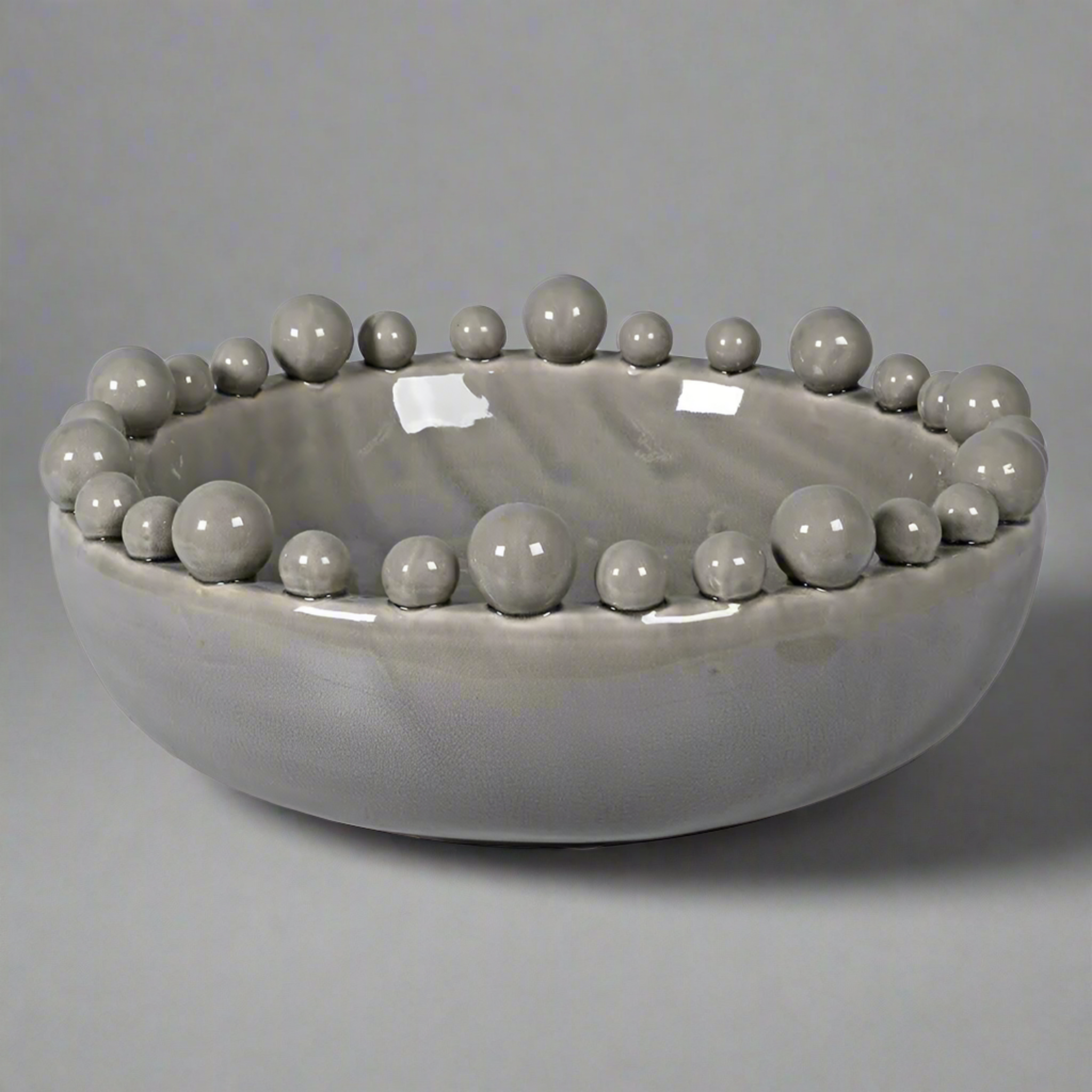 a grey bobble edged bowl 38cm wide