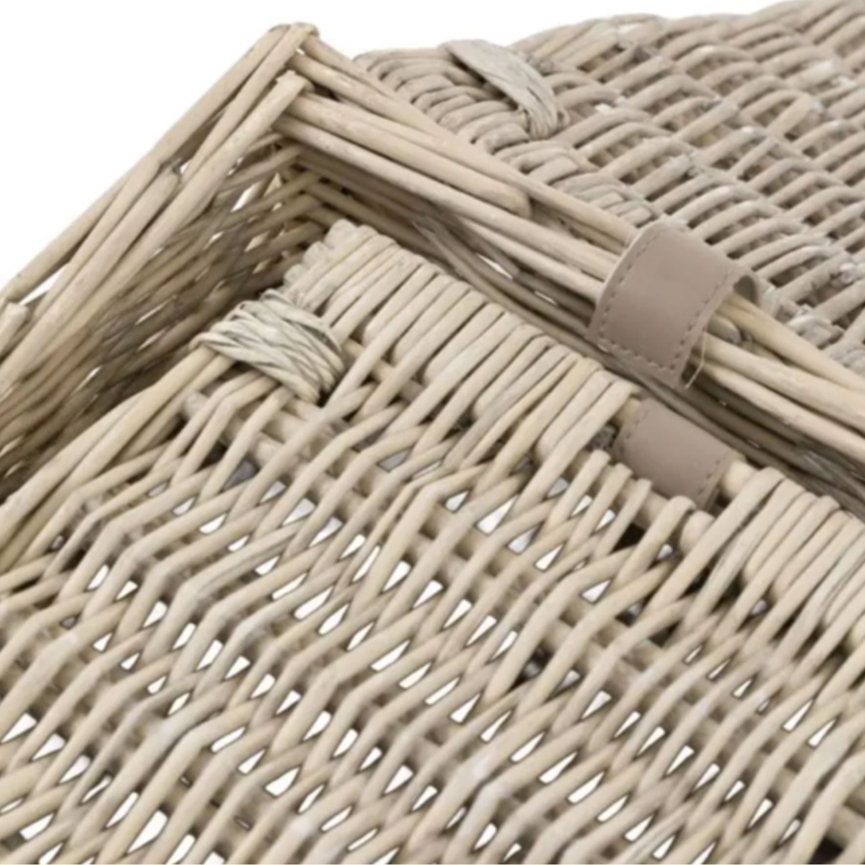 Close-up of a woven basket with a beige handle