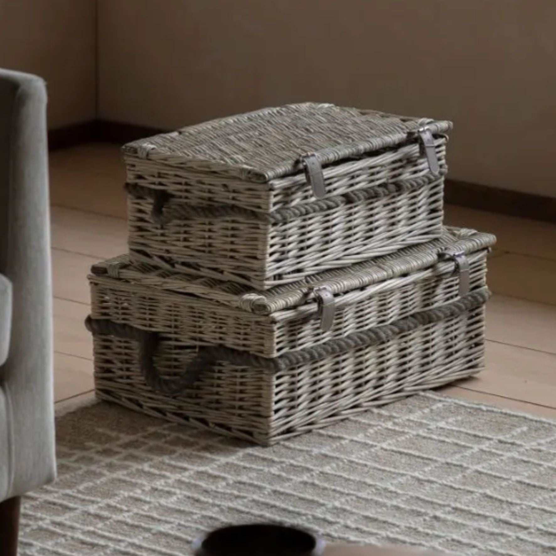 lidded baskets stacked on a rug with lids closed
