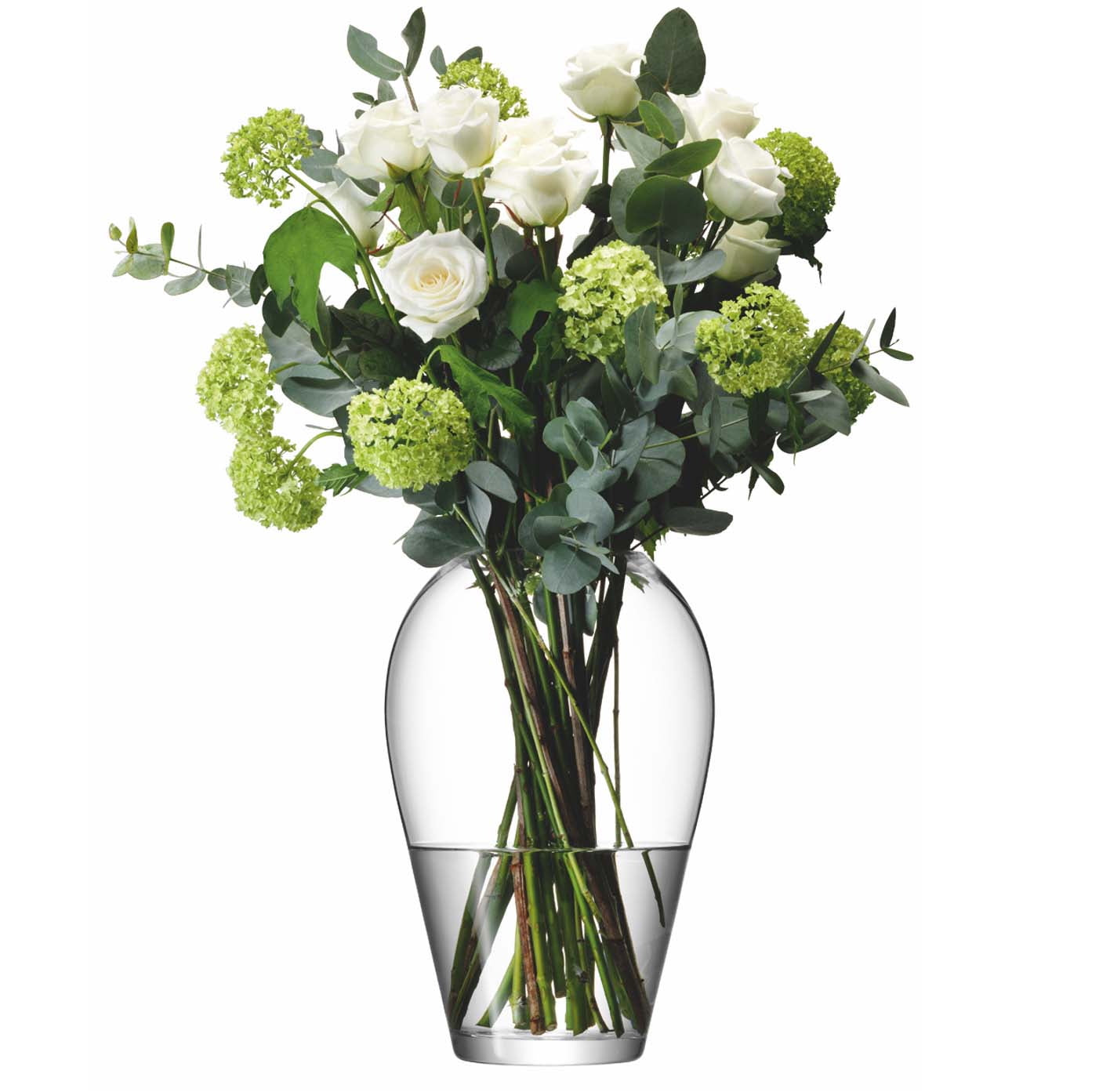 Clear glass vase with a bouquet of white and green flowers on a white background