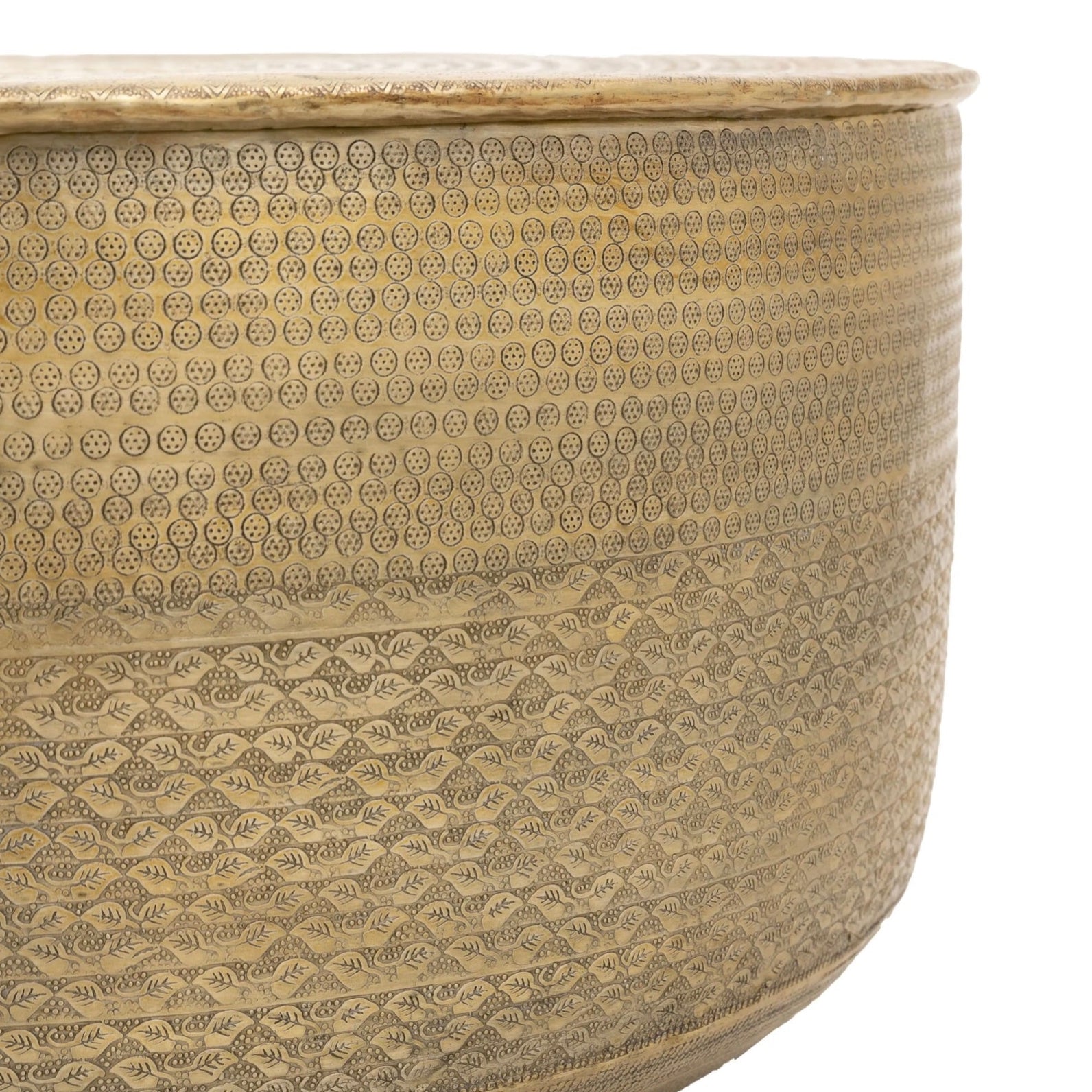 Round antique brass embossed coffee table on a white background