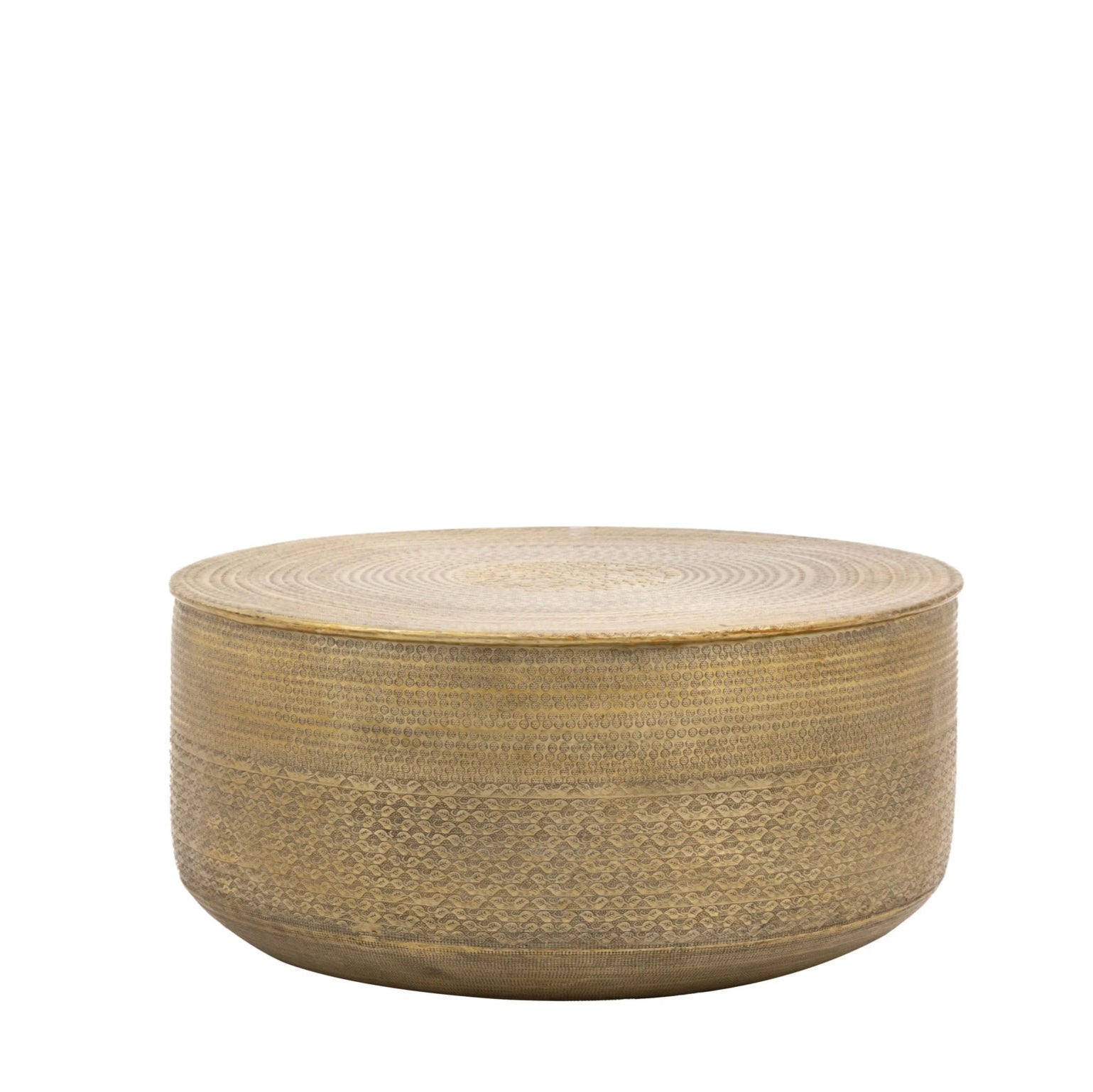 Round antique brass embossed coffee table on a white background