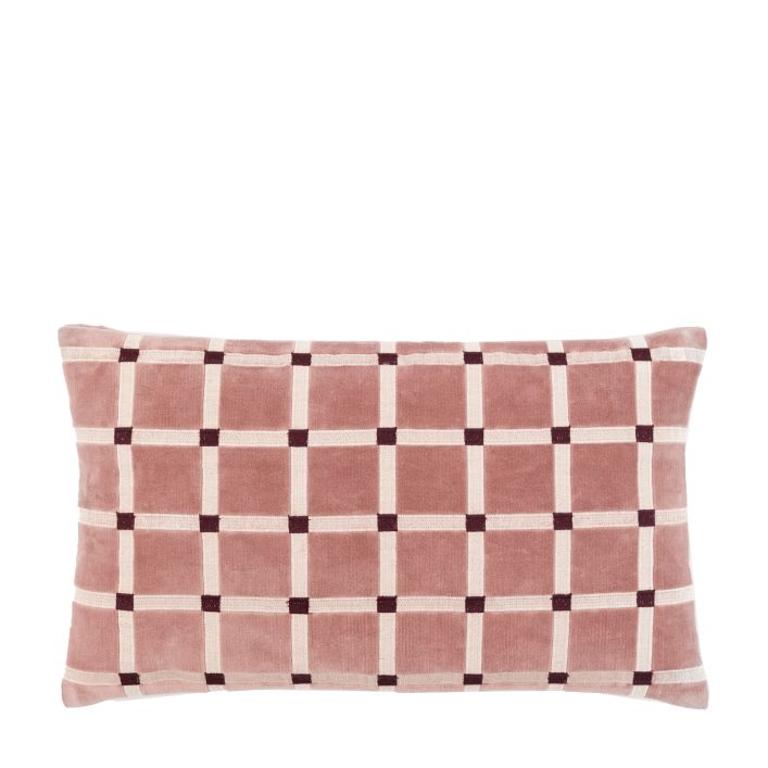 Checkered pillow with pink and white pattern on a white background